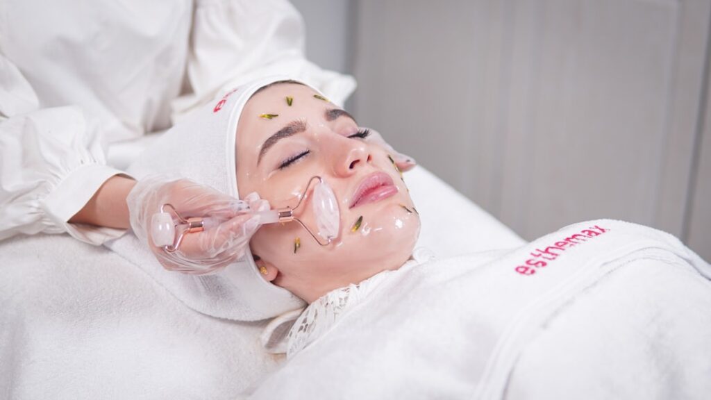 Med spa before and after photos displayed on a tablet at a modern aesthetic clinic