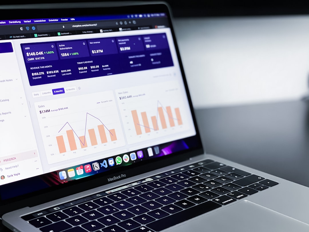 Med spa owner comparing Google Ads vs social media ads performance on a laptop dashboard