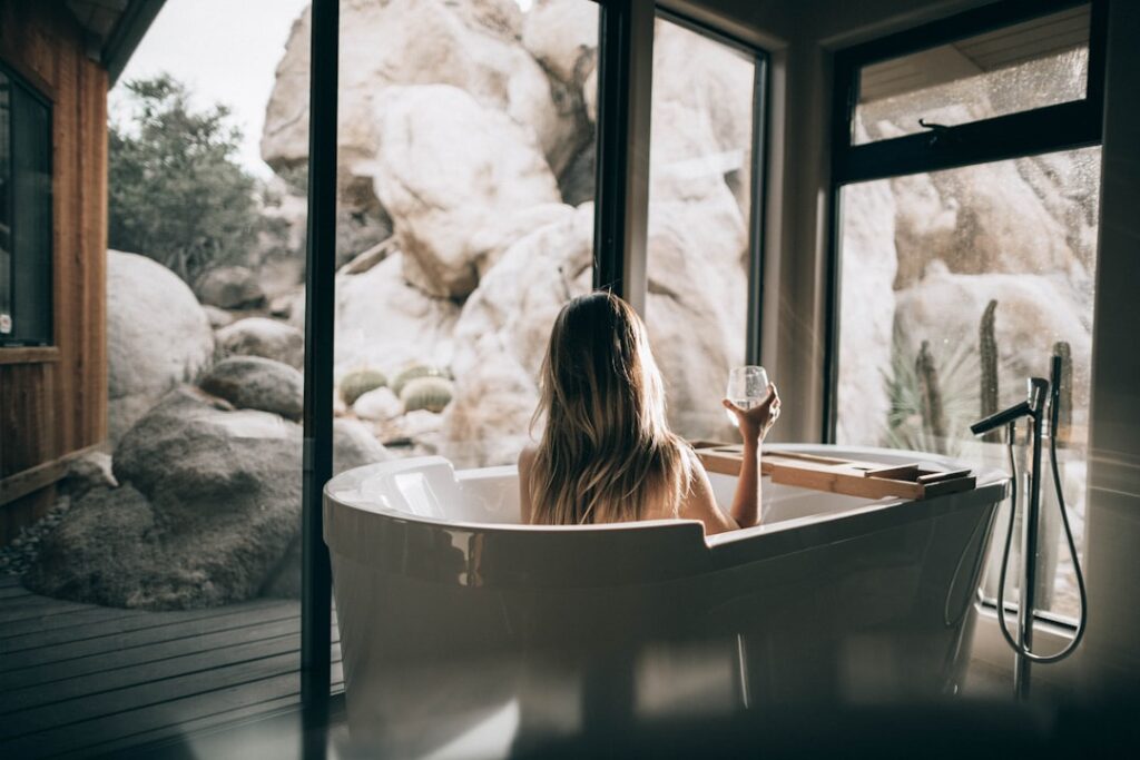 Med spa owner reviewing online reputation management strategy on laptop
