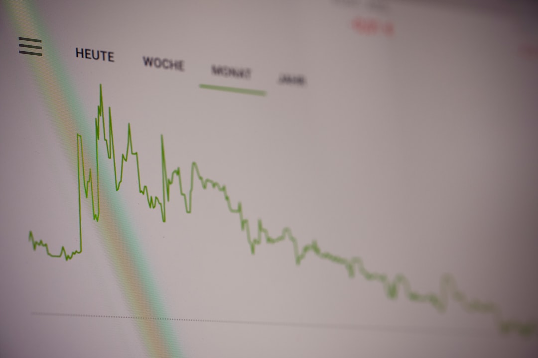 Med spa owner reviewing rising Google Ads costs and CPC data on a laptop dashboard in 2026