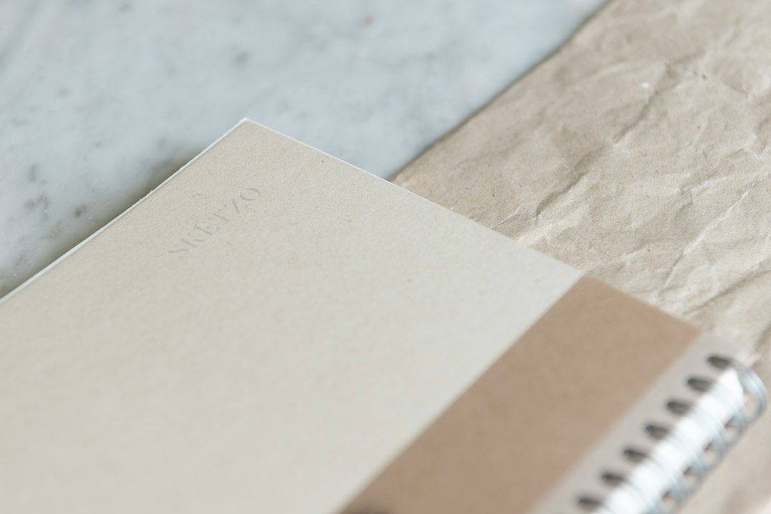 Open notebook on a linen desk surface representing a med spa AI search publishing cadence plan