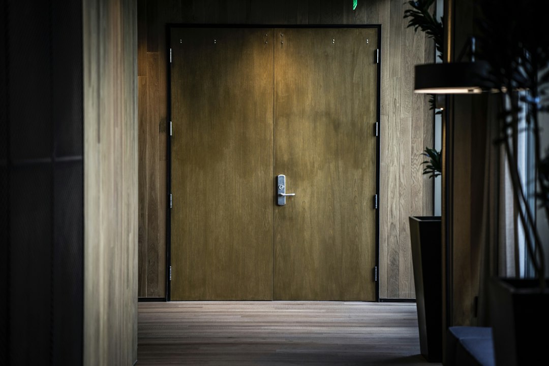Brass door handle on a luxury interior door, representing the med spa marketing agency red flags that keep owners locked into bad contracts