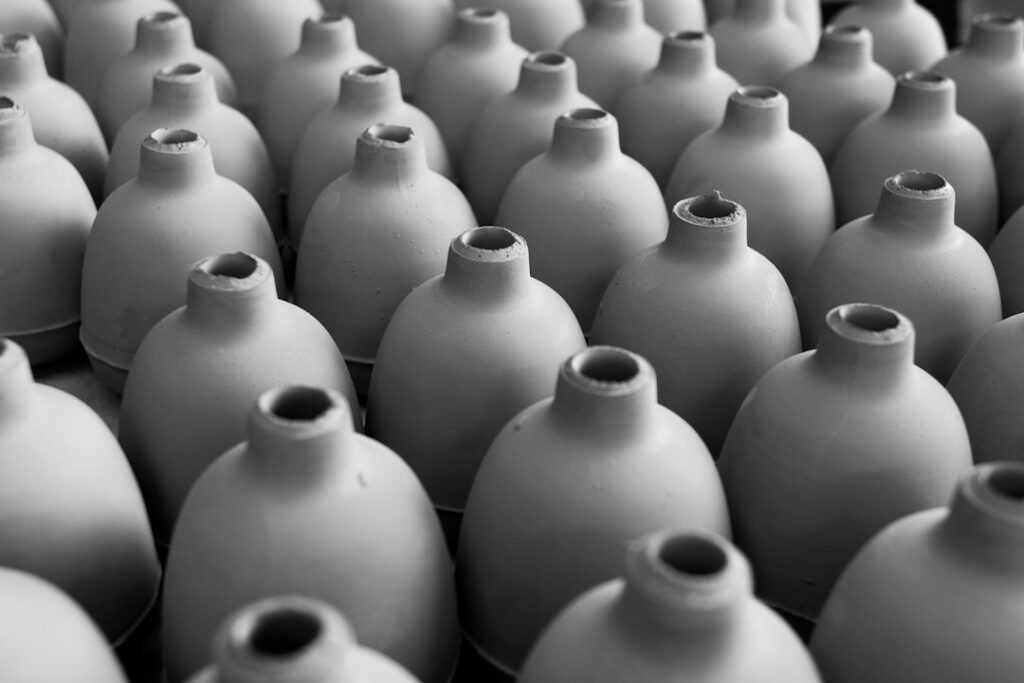 Close-up of ceramic skincare bottles representing med spa review velocity and reputation building