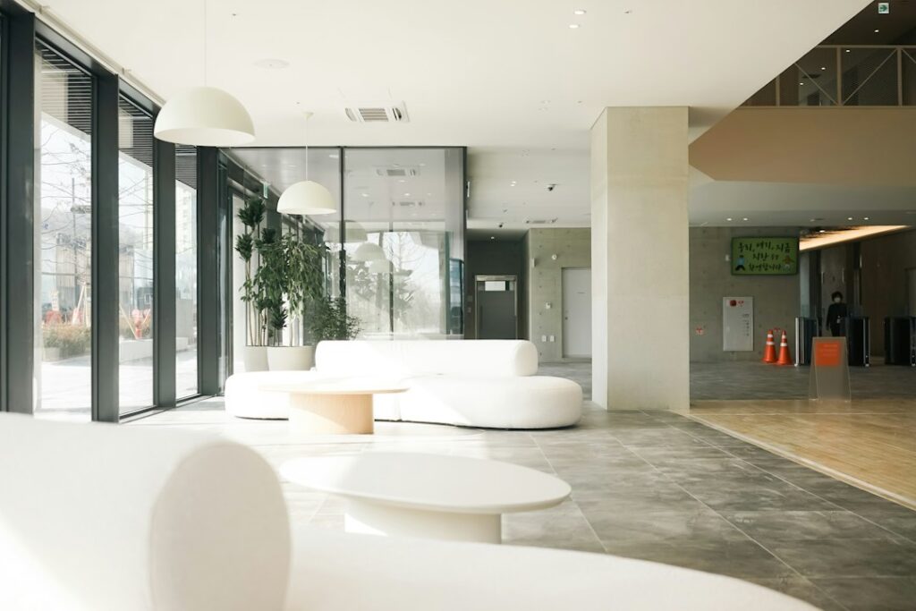 Bright, minimalist med spa lobby representing a welcoming patient journey experience