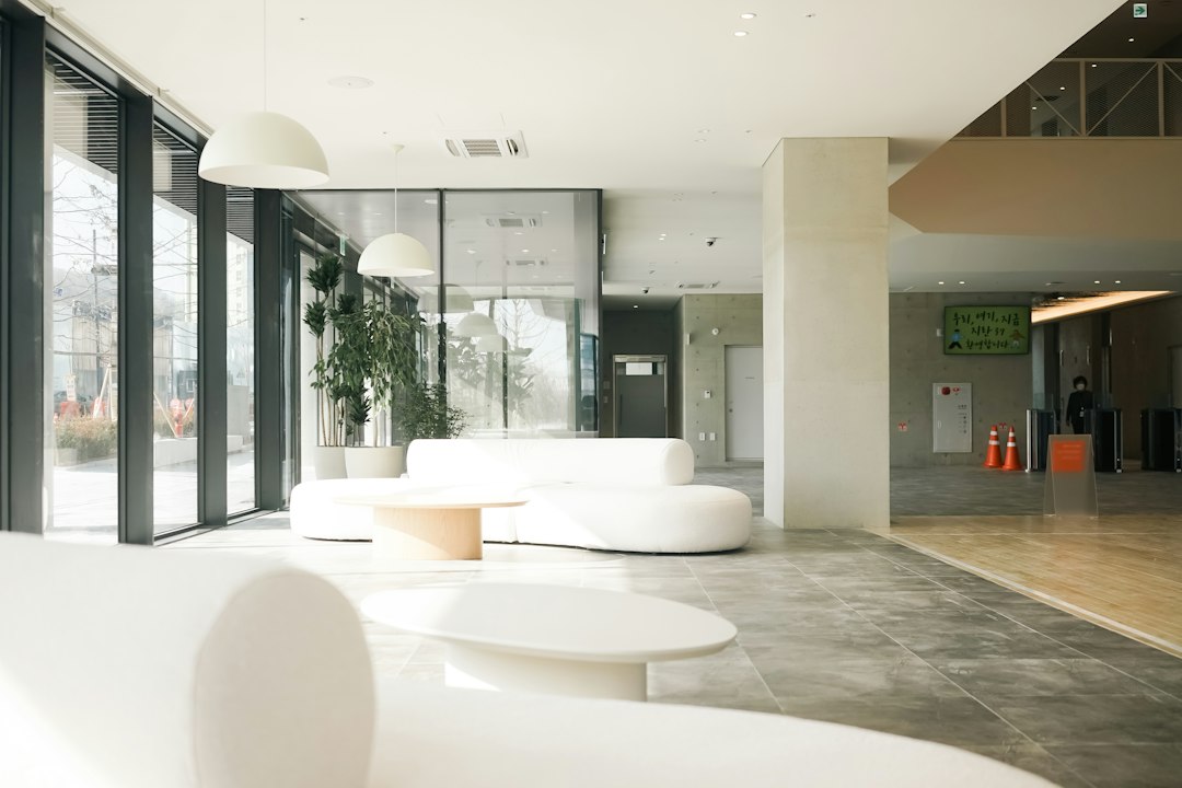 Bright, minimalist med spa lobby representing a welcoming patient journey experience