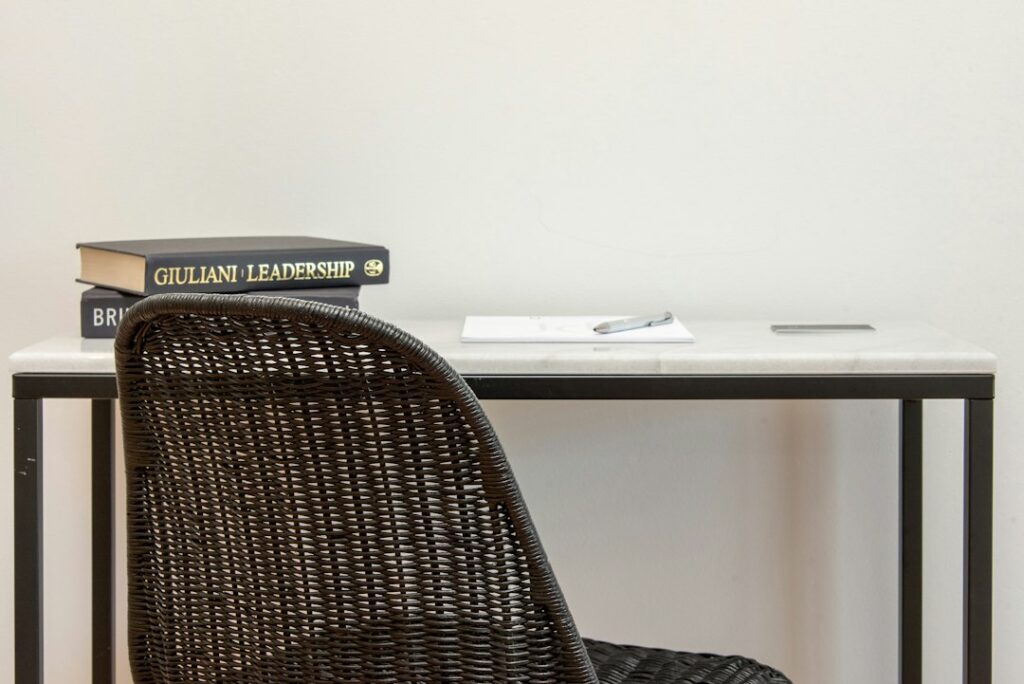 Minimalist boutique reception desk representing med spa website chat vs phone call patient communication choices